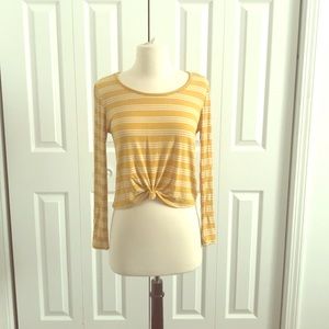 A yellow long sleeve shirt